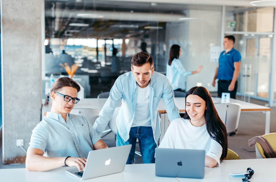 business team discussing software