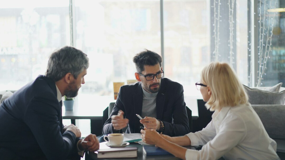 business team discussing software
